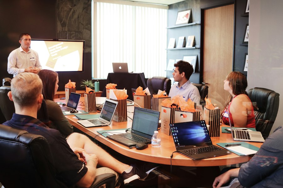 Business team reviewing a corporate video presentation in Houston